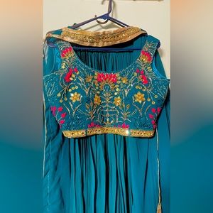 Teal green lehenga with golden work